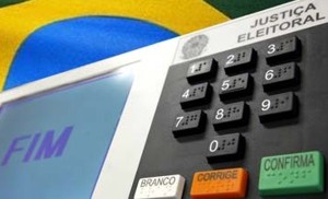 Já são 26 municípios com novas eleições marcadas pelos TREs tre-ba-urna-eletronica-bandeira-brasil