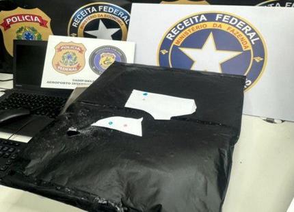 Passageira é presa durante escala em Confins; 3,5 kg de cocaína estavam escondidos em fundo falso de mala