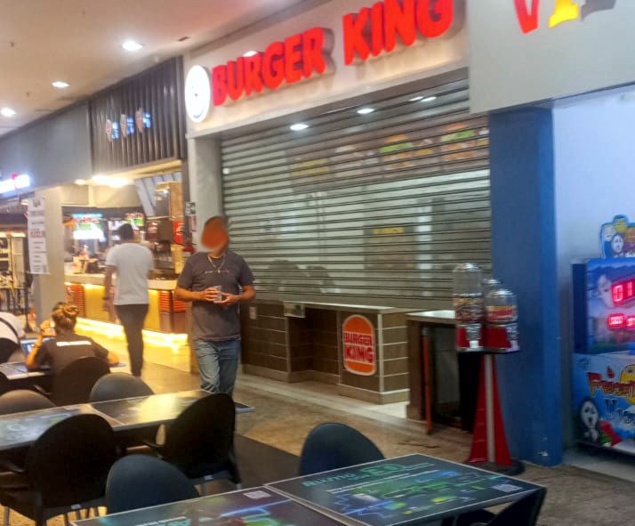 Burger King de Divinópolis fecha para limpeza; denúncia mostra sujeira e insetos, enquanto shopping rebate versão de infestação de baratas